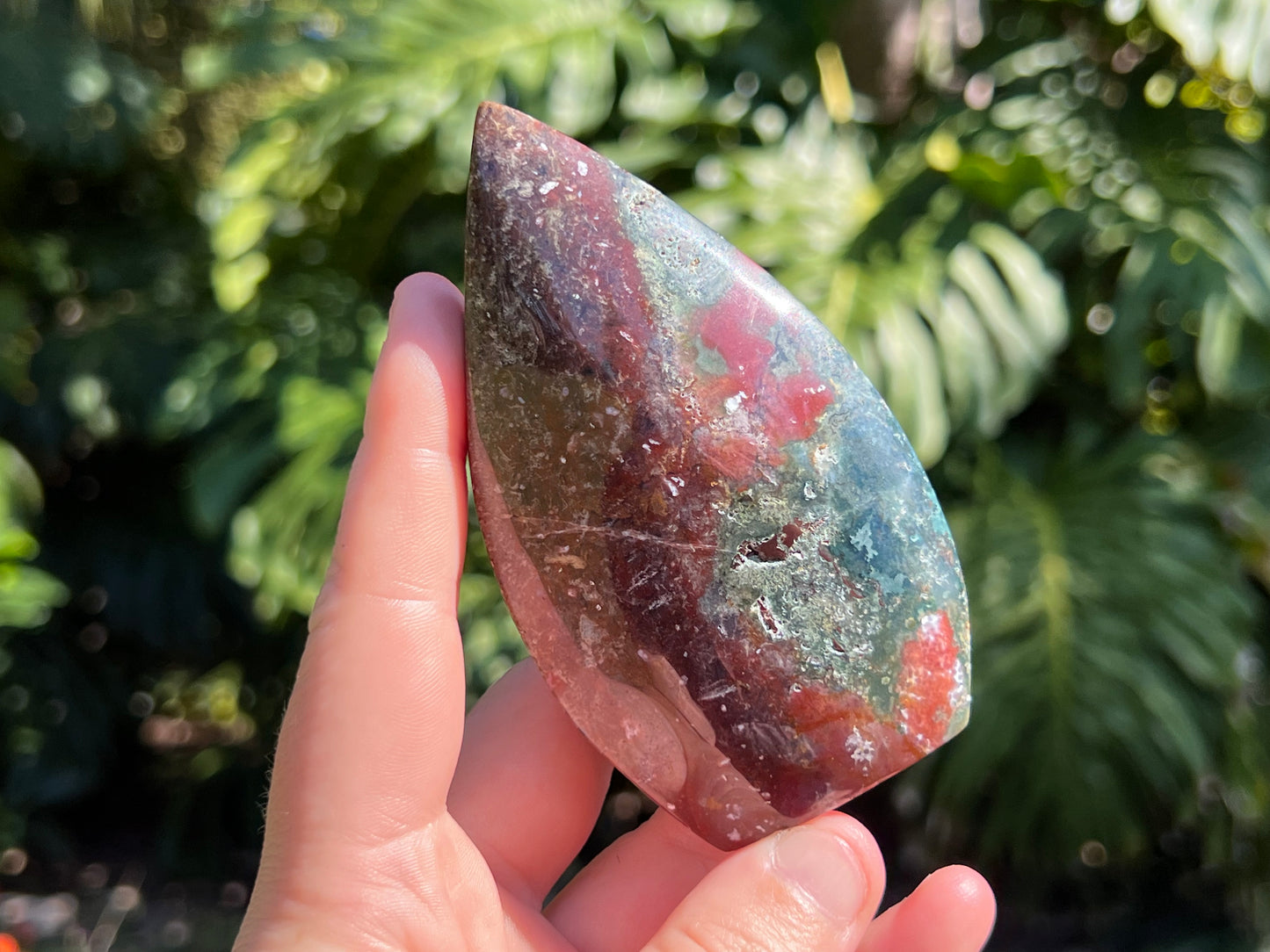 Ocean jasper flame in my hand for a size guide