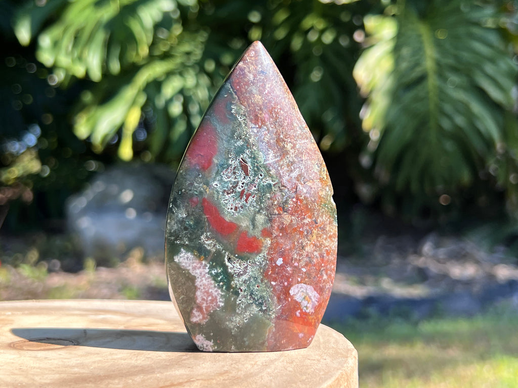 This stunning Ocean jasper flame has so many beautiful colours including green and red 
