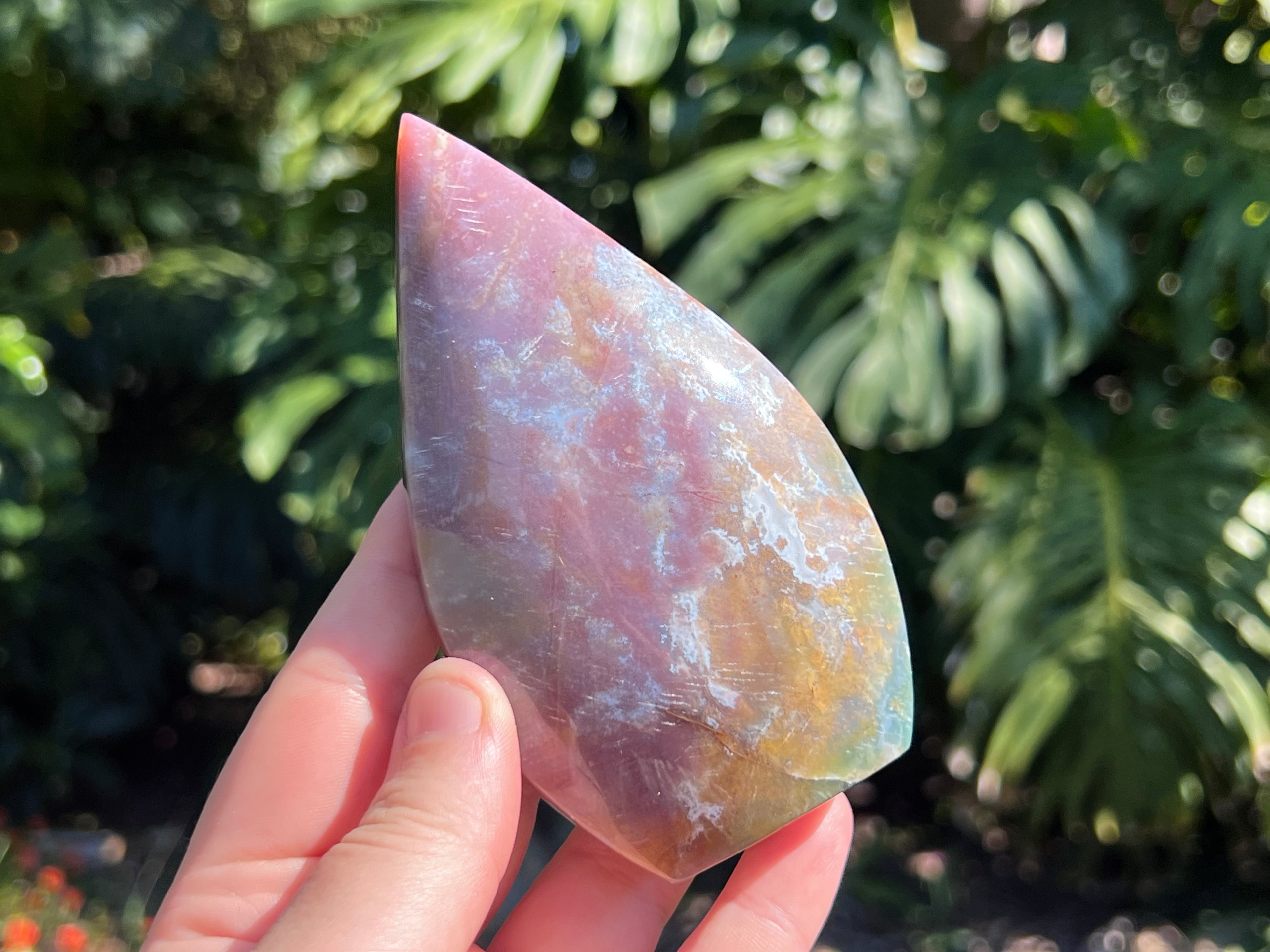 The other side of the ocean jasper flame in my hand as a size guide 