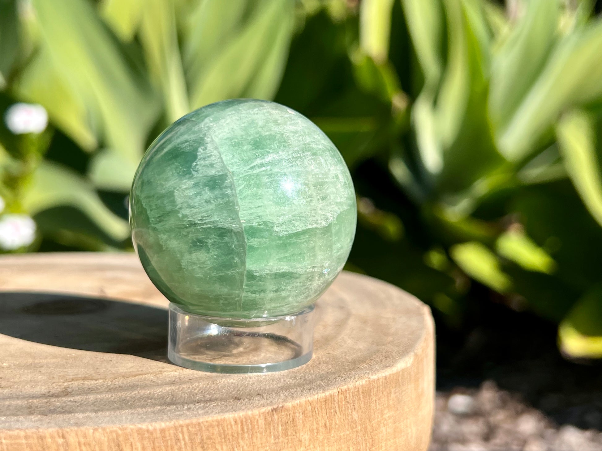 Green fluorite sphere on a sphere stand 