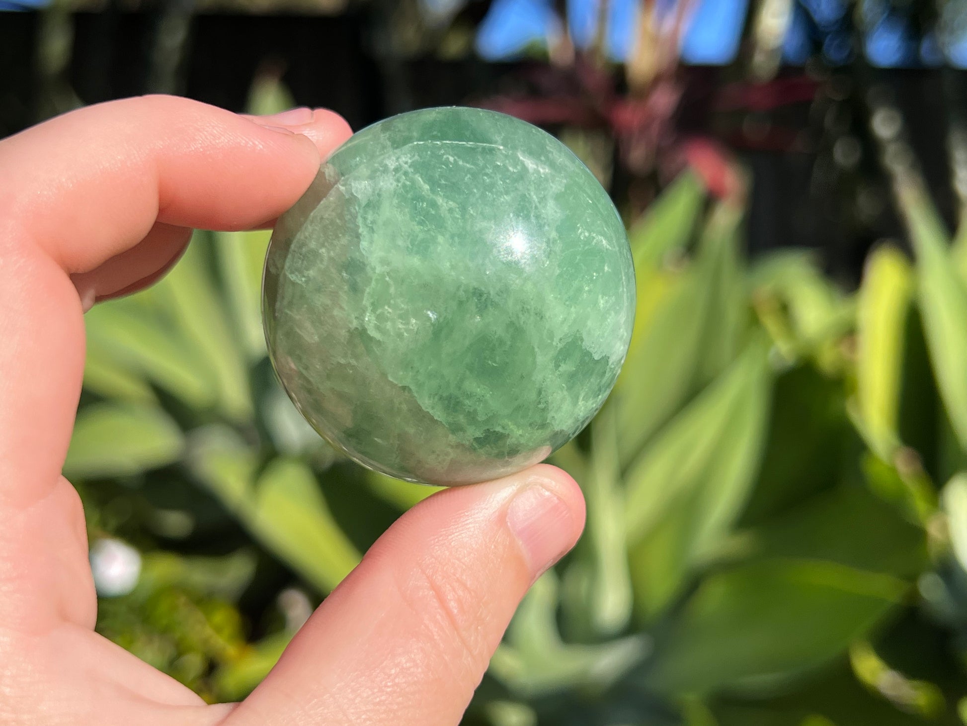 Green fluorite sphere in my hand as a size guide 