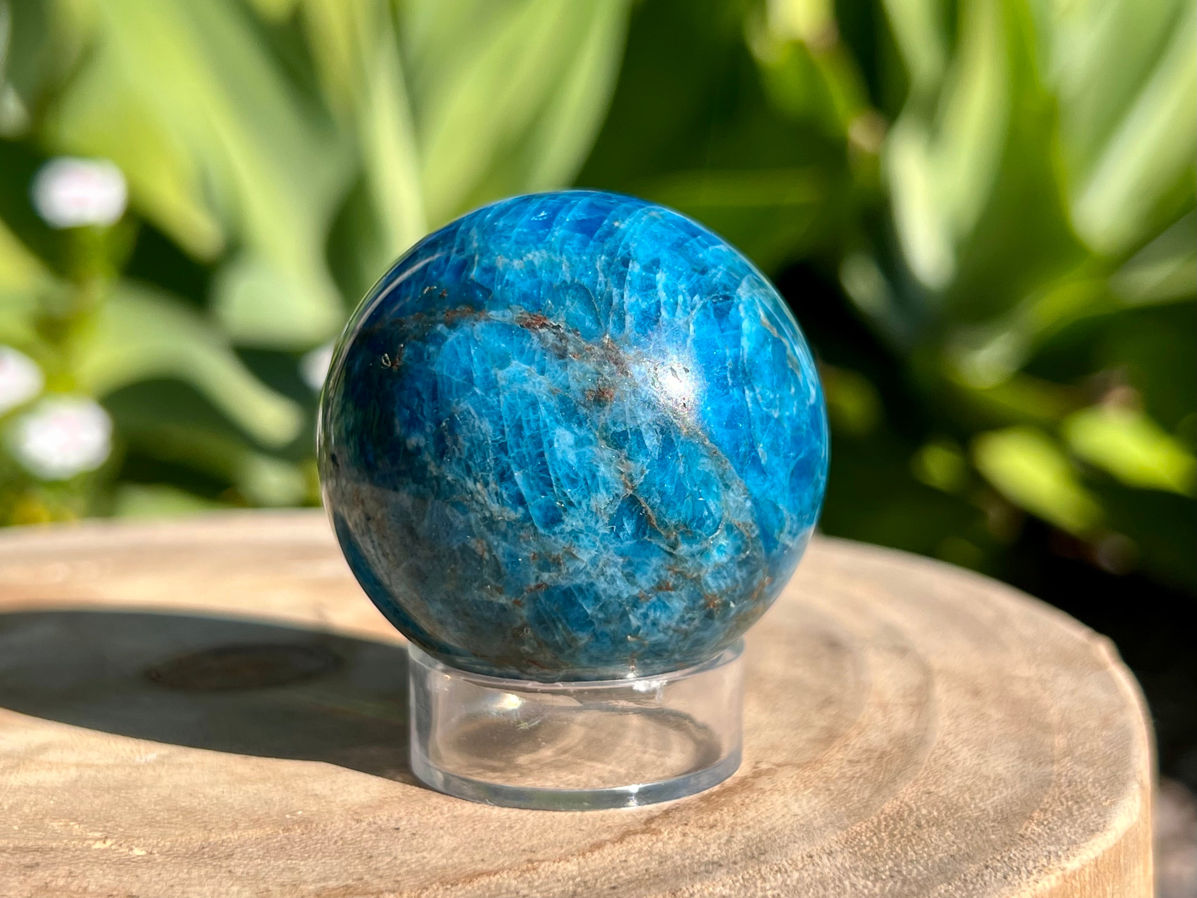Blue Apatite sphere with plastic sphere stand 
