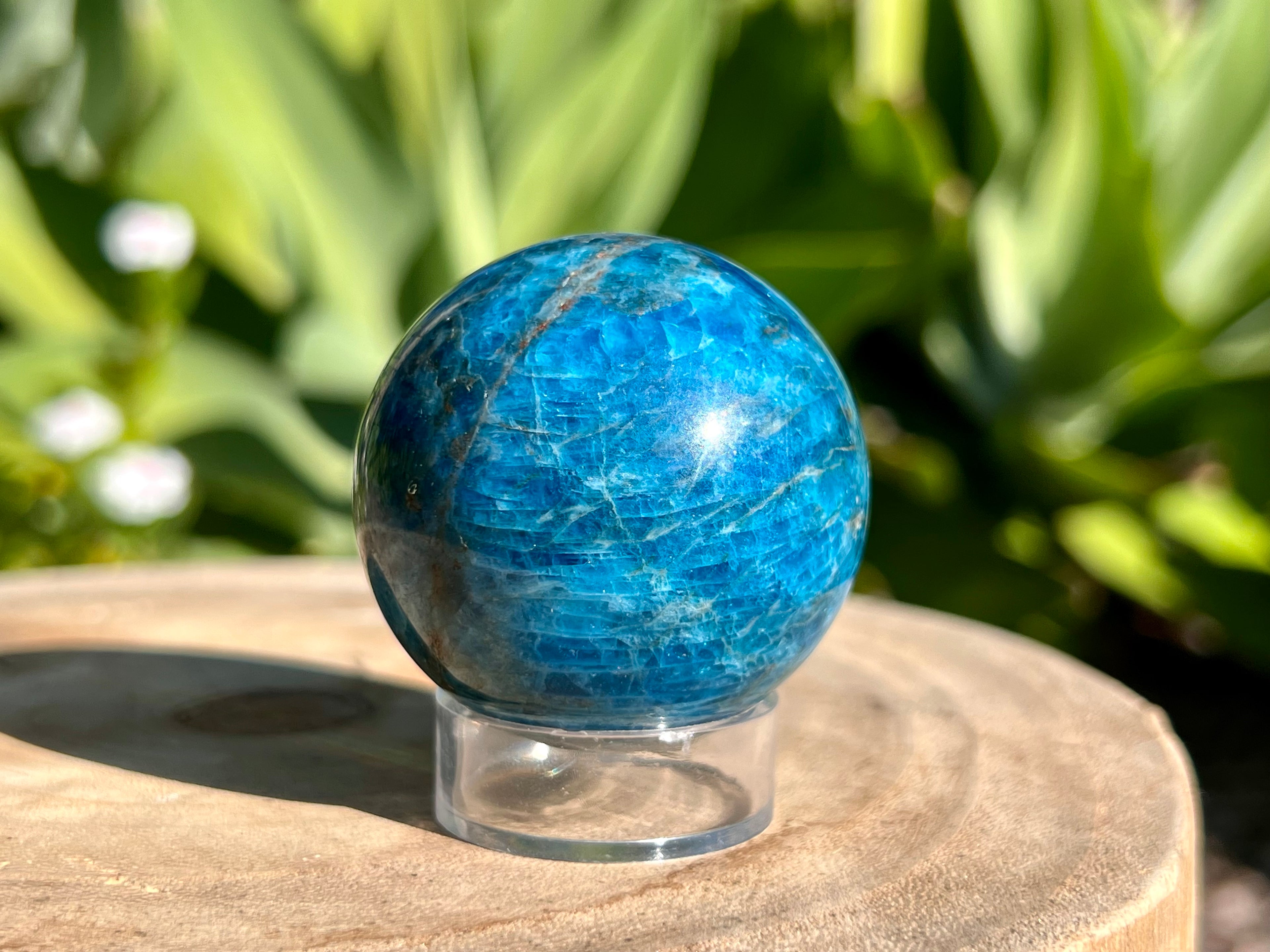 Blue Apatite sphere with sphere stand. This photo shows the beautiful detail in the stone 