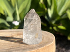 Clear quartz generator point with inclusions 
