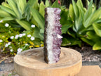 Amethyst cluster with chunky points. amethyst for spiritual protection and intuition. Natural Crystal Cluster side view. You can see the beautiful band of white quartz before the chunky amethyst points 