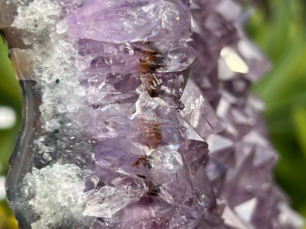 Amethyst cluster with inclusions in the points 