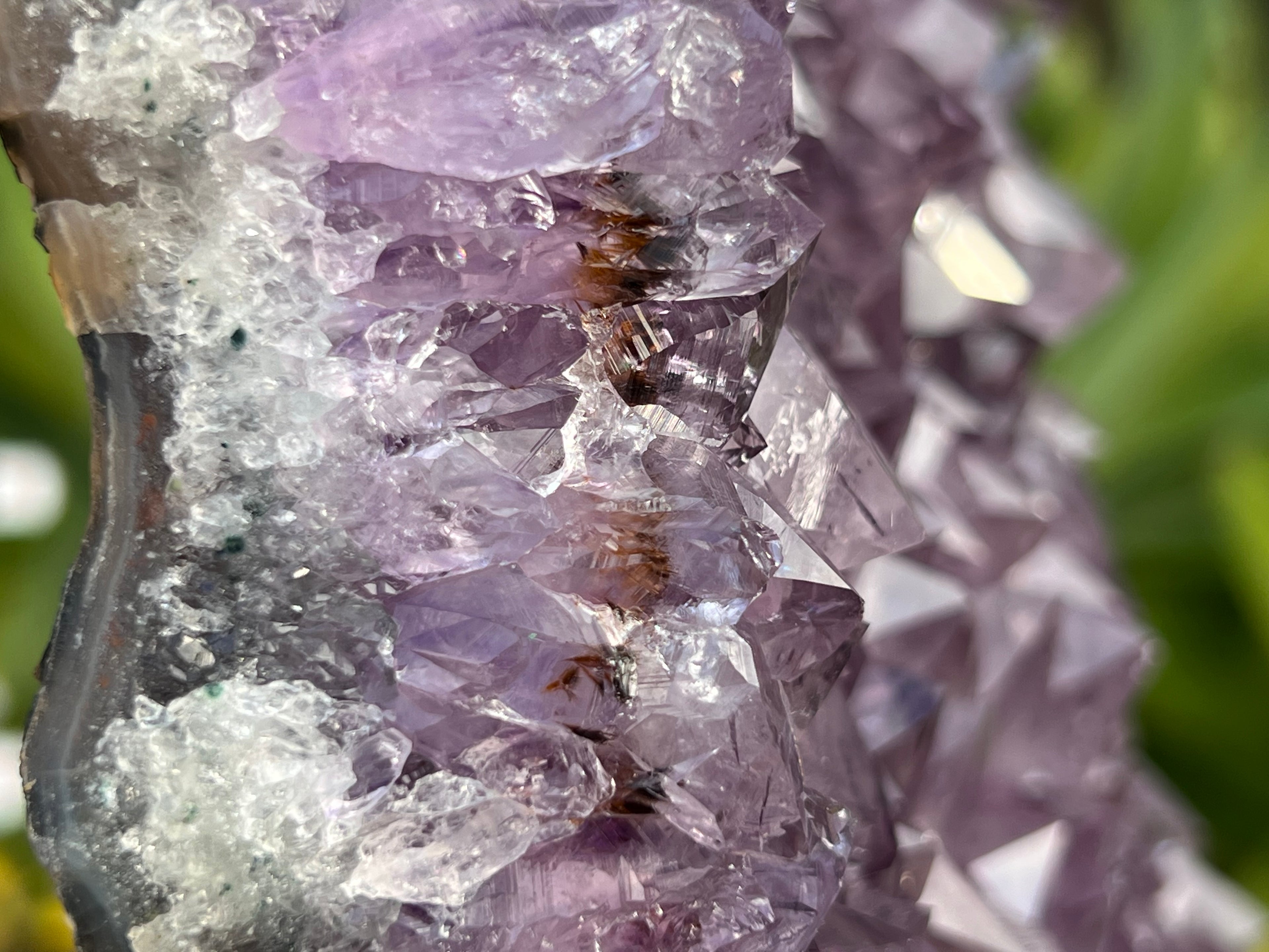 Amethyst cluster with inclusions in the points 